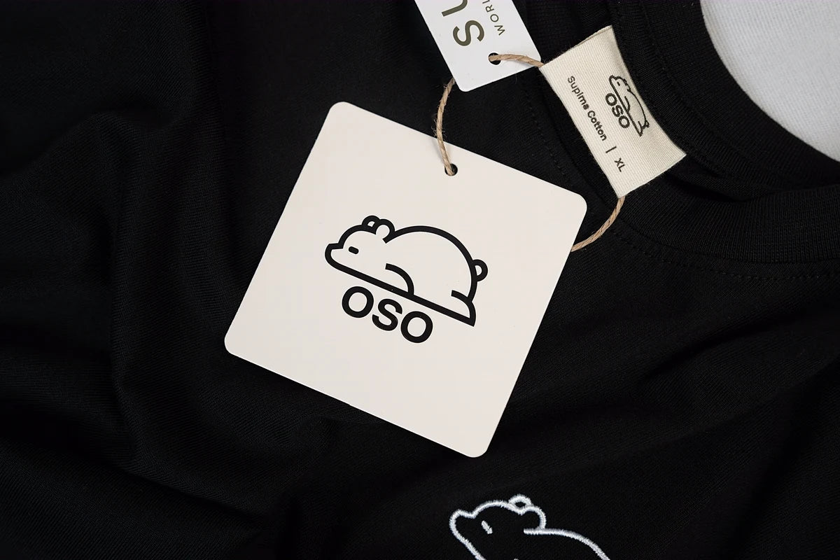 The OSO hangtag on the Bear Tee in Night